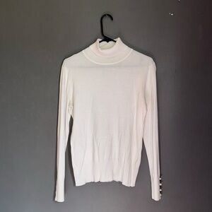 White turtleneck. Tag is missing. Fits like a small
